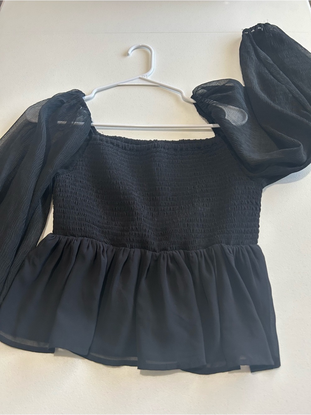 Guess Black Smocked Peplum Top with Sheer Puff Sleeves